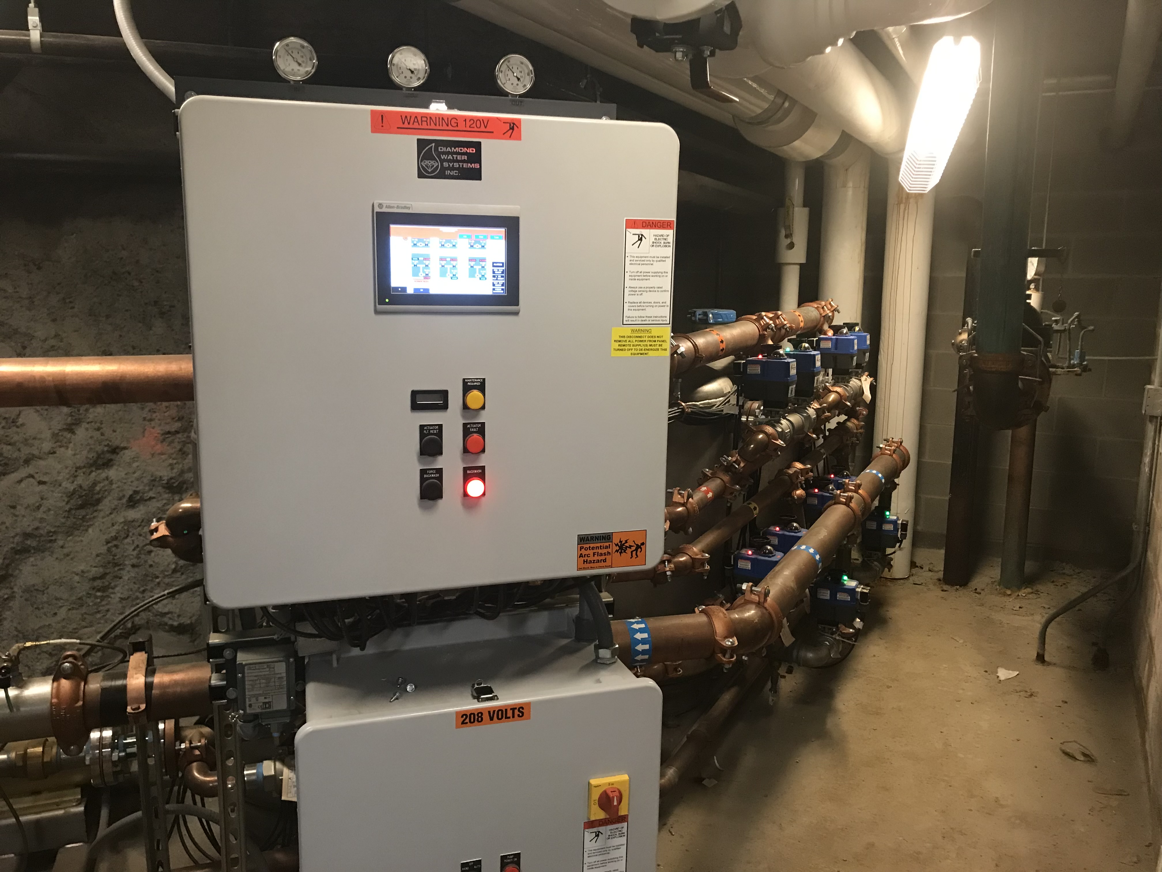 Diamond Water Systems control panel with copper piping and automated valves